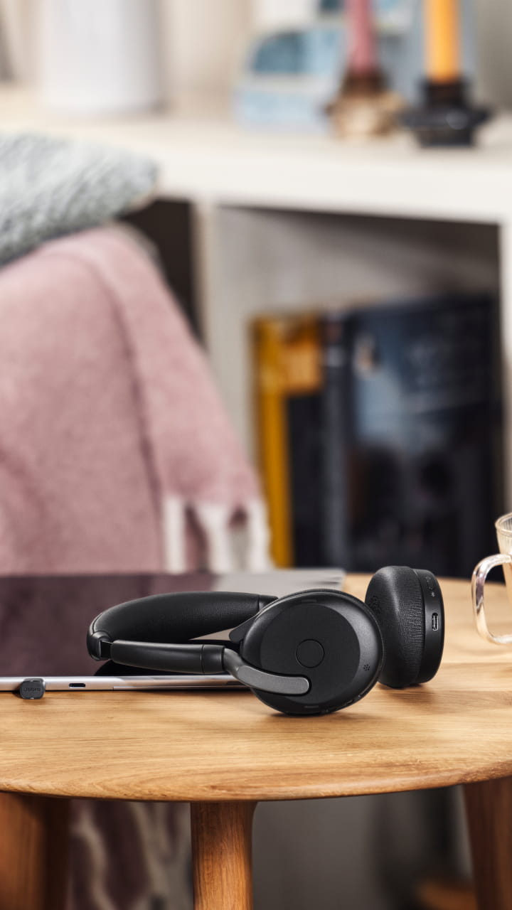 Jabra Evolve2 65 Flex headset on a table – ideal for hybrid working and home office