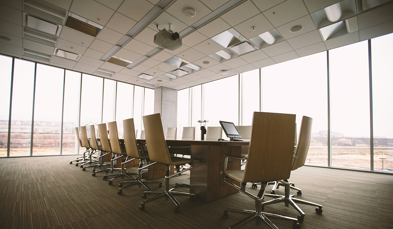 Source: https://unsplash.com/photos/oval-brown-wooden-conference-table-and-chairs-inside-conference-room-GWe0dlVD9e0