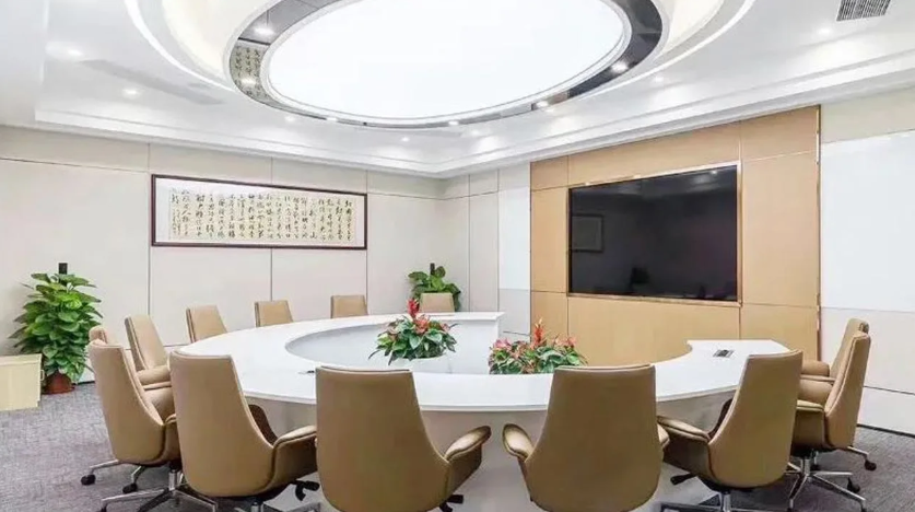 U–shaped table in a conference room with a bright overhead light. Source: https://www.dious-furniture.com/news/Hotel-Furniture-Solution-for-Wing-Mau-Building-182.html